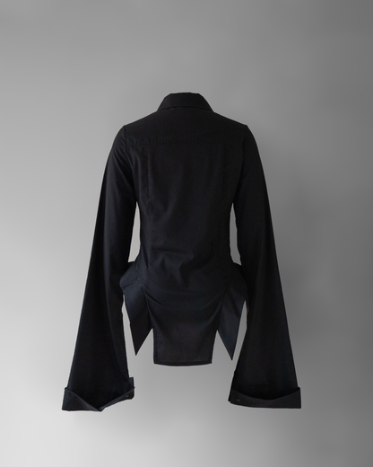 back photo of co11ared blouse, a black blouse with wide long sleeves floating in space on a grey background.